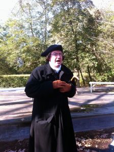 A first-person interpreter takes on the persona of founding father Patrick Henry for "A Public Audience with Patrick Henry" in the garden behind the Palace. 