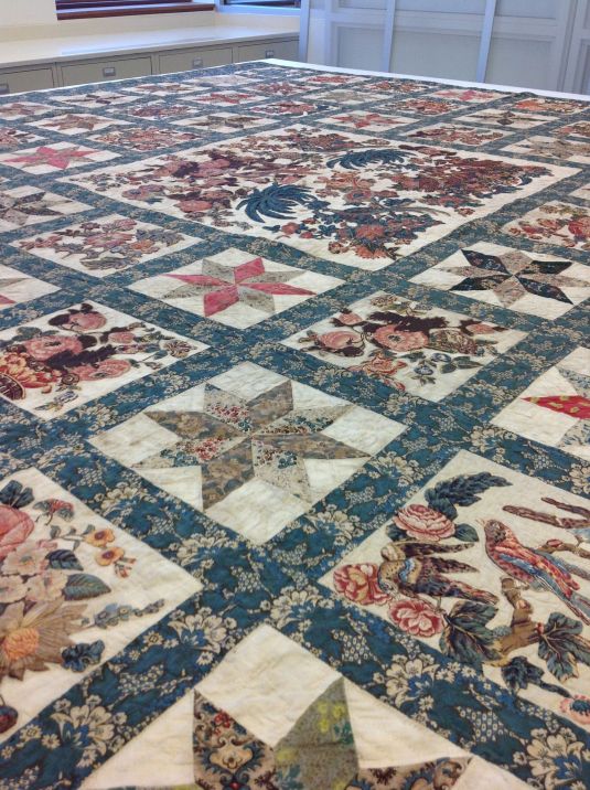 Over sized quilt being restored at the Textile Lab
