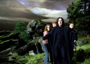 Still from HP and the Prisoner of Azkaban. Snape rushes in front of Harry, Ron and Hermione to protect them from a werewolfe. Maybe he's just being a good teacher/adult. But I doubt whether some other teachers at the school would have done the same. [Image courtesy: Warner Brothers]