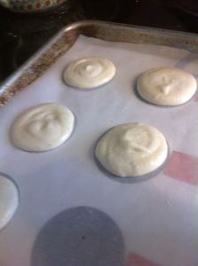 First batch as I'm piping the batter onto the parchment. (You can see the template under the parchment paper. I slid that out before the cookies went into the oven.)