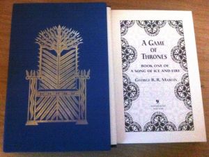 Dust slipcase and title page of George R.r. Martin's A Game of Thrones.