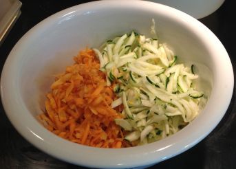 Usually I hand grate my vegetables , but 4 cups (2 carrots / 2 zucchini) is a bit much for my wee little grater. So I pulled out the food processor. 