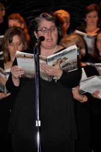 A more modern photo of me singing the part of the Voice of God 2 in "Can You Hear Me Now?" with the Our Lady of Grace music group in 2011.