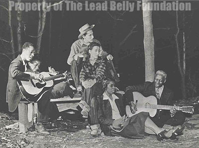 Lead Belly with Josh White and others. (Image courtesy: the Lead Belly Foundation.)