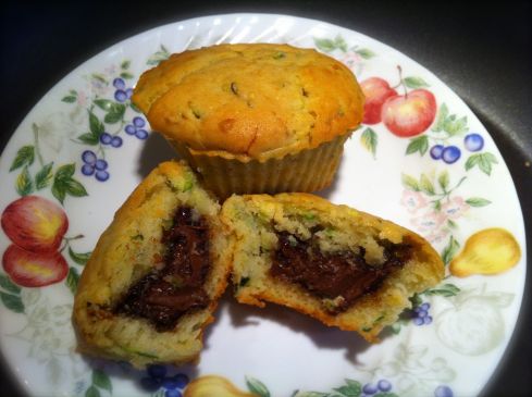 A little Nutella surprise is hidden in side these zucchini muffins. The perfect way to warm up on a snowy day.