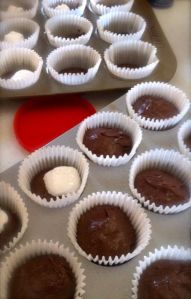 Marshmallow in place (top) and covered over with the top layer of brownie.