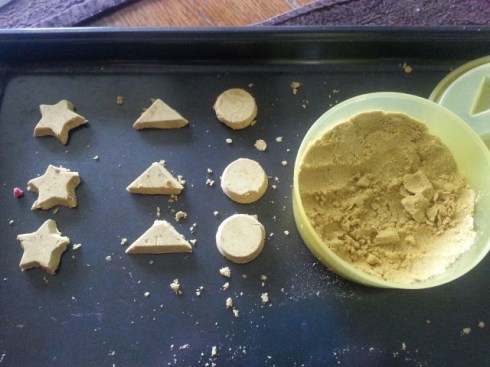 The other day she used modeling sand to make "sand cookies".