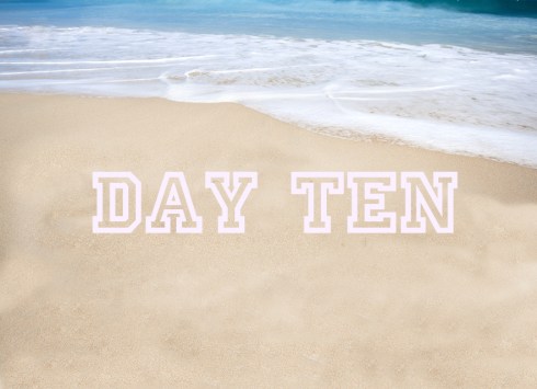 Beautiful tropical beach with the word summer written on the san