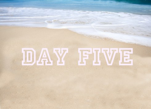 Beautiful tropical beach with the word summer written on the san