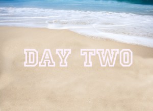 Beautiful tropical beach with the word summer written on the san