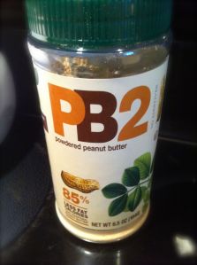 I discovered powdered peanut butter at my local grocery store. It is great for smoothies and baking, and has far less calories than traditional peanut butter. 